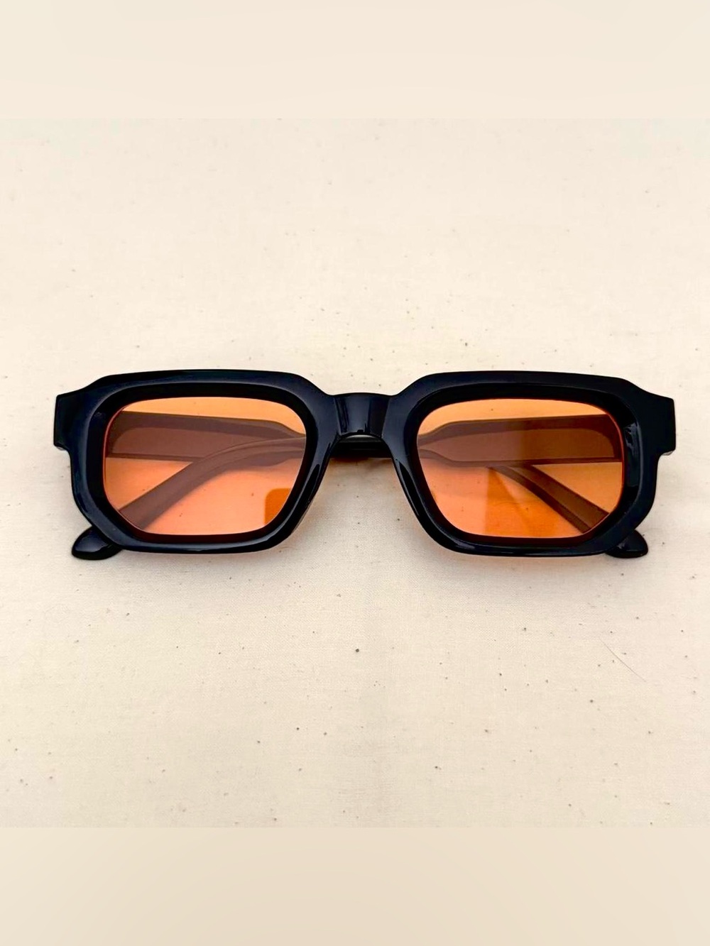 Bold Black Frame Sunglasses with Orange Lenses